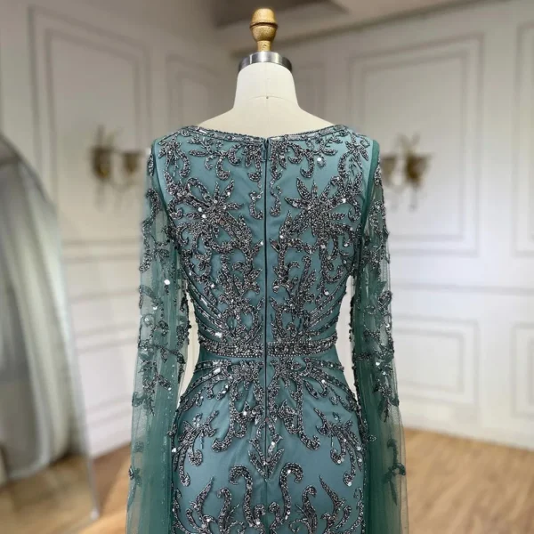فساتين سهرة بحورية البحر بياقة مربعة وأكمام كيب مطرزة باللون الفيروزي - Image 5