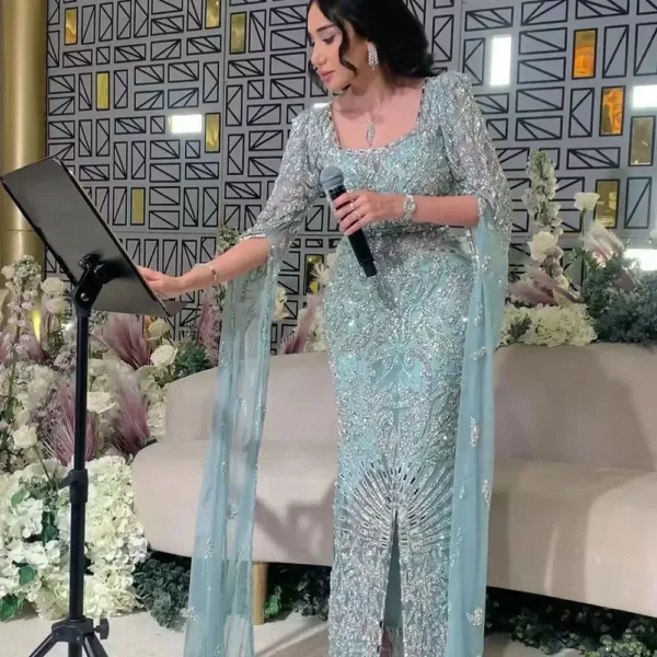 فساتين سهرة بحورية البحر بأكمام كيب مطرزة باللون الفيروزي